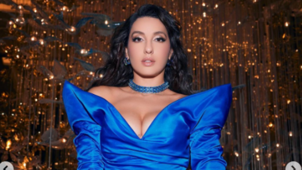 Nora Fatehi का लुक ब्लू ड्रेस में Nora Fatehi का कातिलाना लुक, पोज ने उड़ा दी फैंस की धड़कनें Nora Fatehi का लुक ब्लू ड्रेस में Nora Fatehi का कातिलाना लुक, पोज ने उड़ा दी फैंस की धड़कनें
